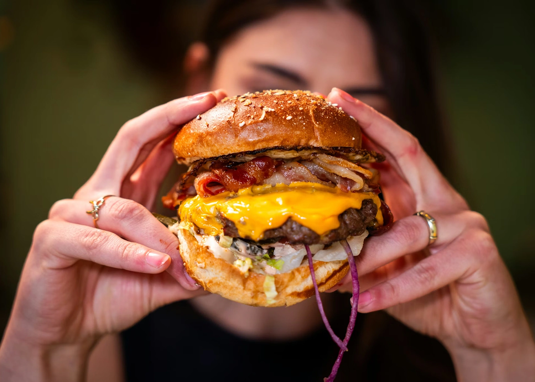 BURGERS Signature Cheesy Burger with dripping cheese